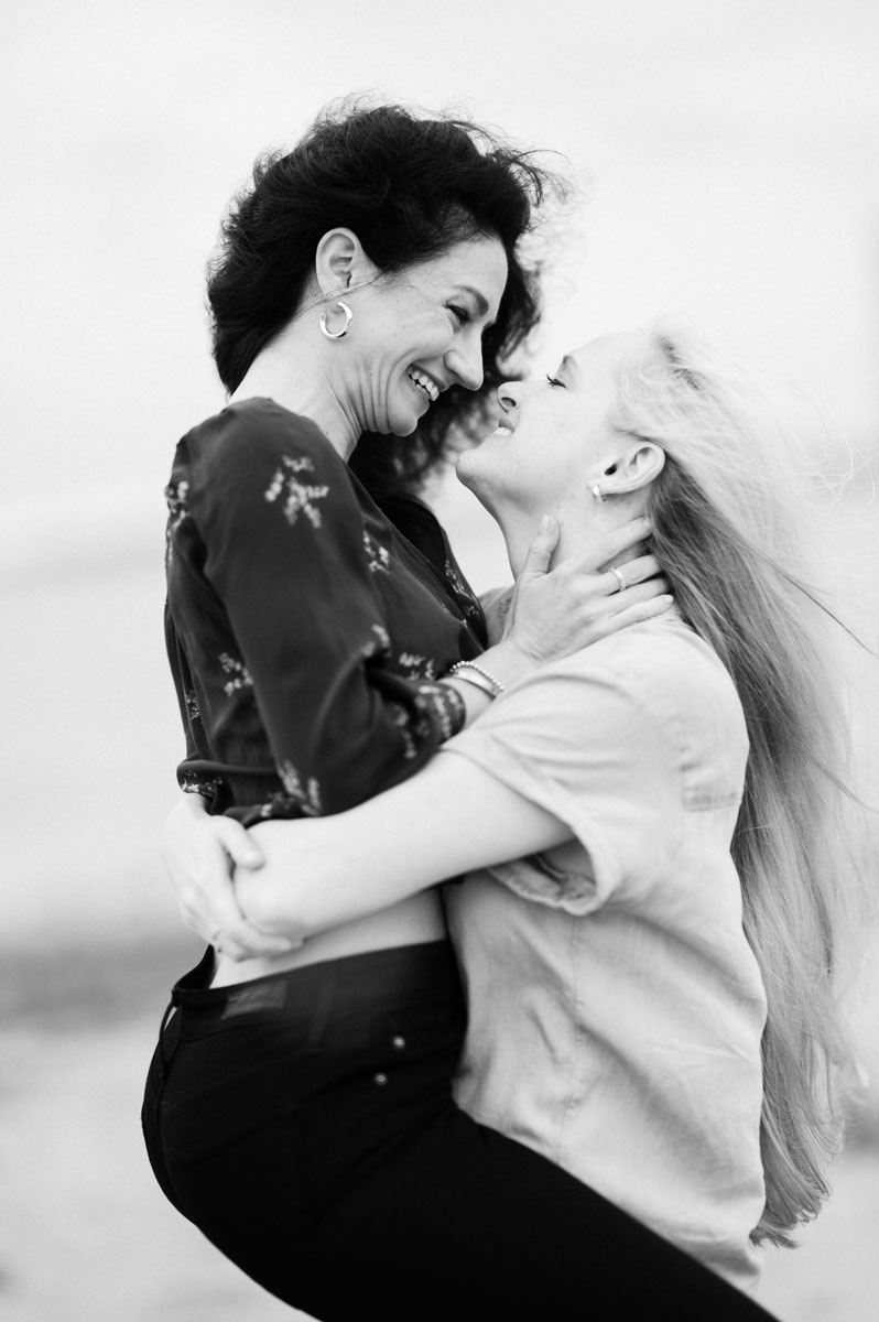 dreamy same sex north avenue beach engagement black & white cinematic photography